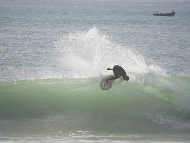 Jamal surfing an Atlantic wave